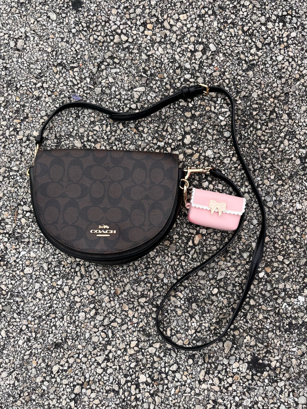Coach Brown Signature Saddle Crossbody with Pink Charm